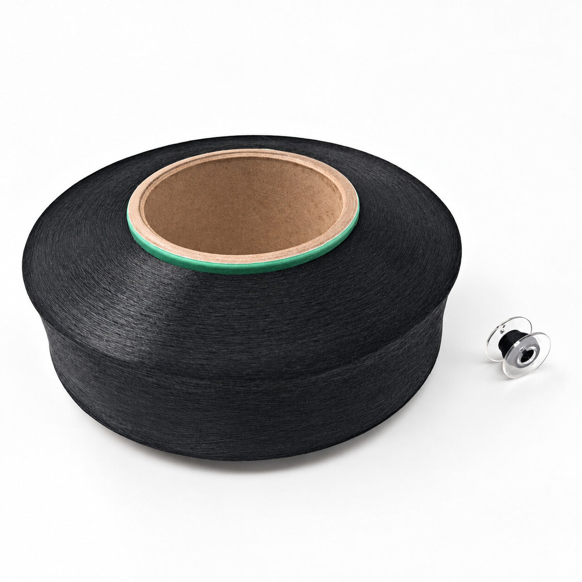 Factory cone and small spool shown for size comparison